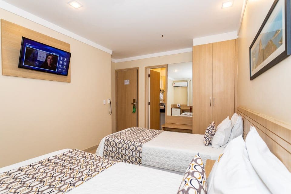 Standard Twin Room, 2 Twin Beds, Private Bathroom | Minibar, in-room safe, desk, blackout drapes