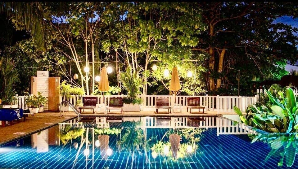 Outdoor pool, open 7:00 AM to 9:00 PM, pool umbrellas, sun loungers