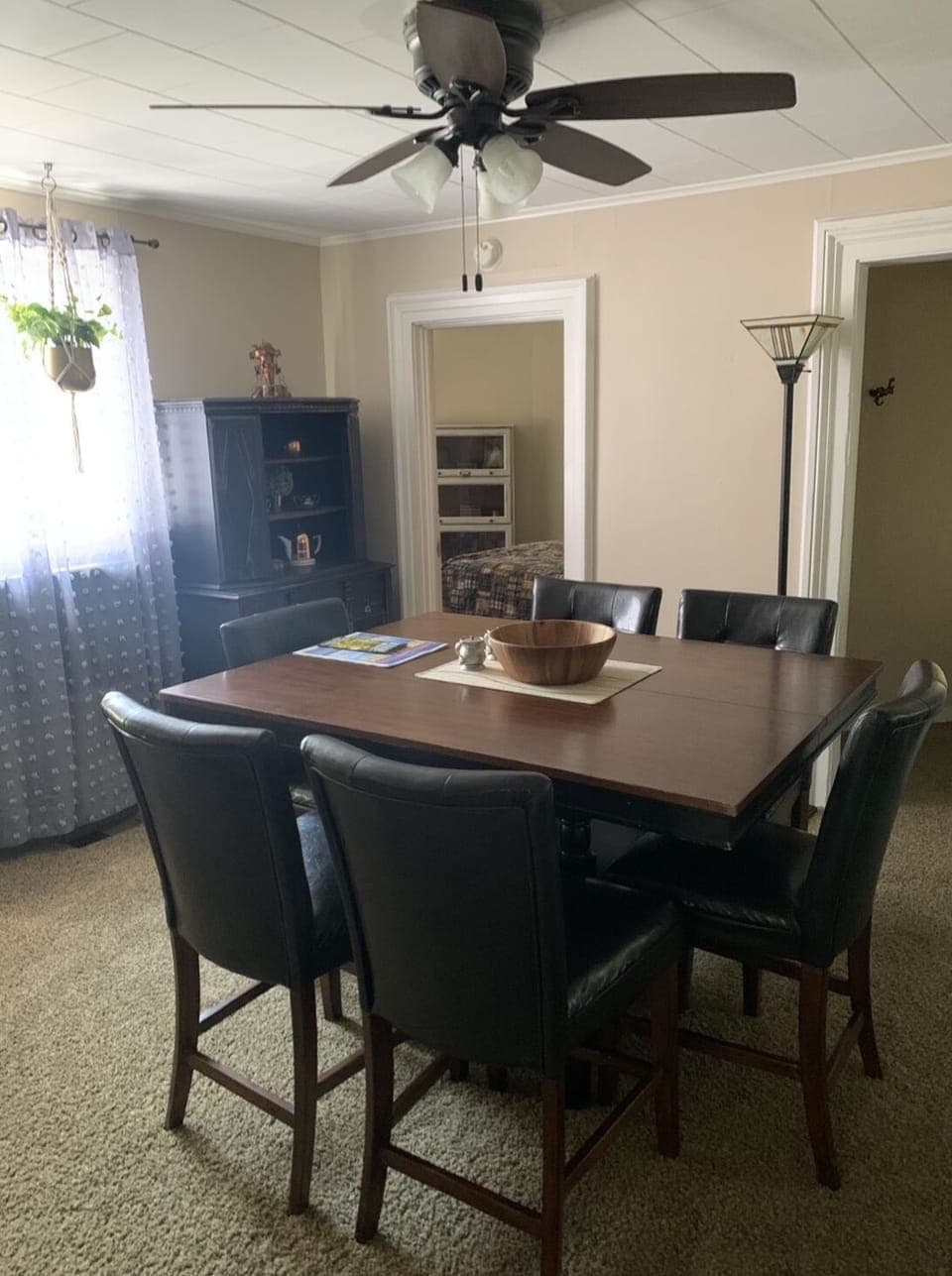 Dinning room table can see TV in living room while eating