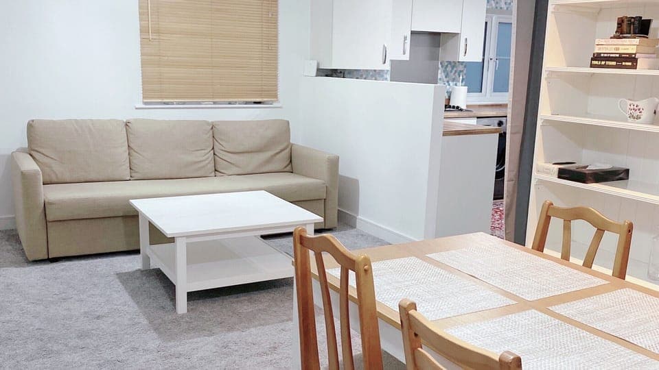 Living & dining room; dining table with 6 chairs; wall shelf with dinnerware 