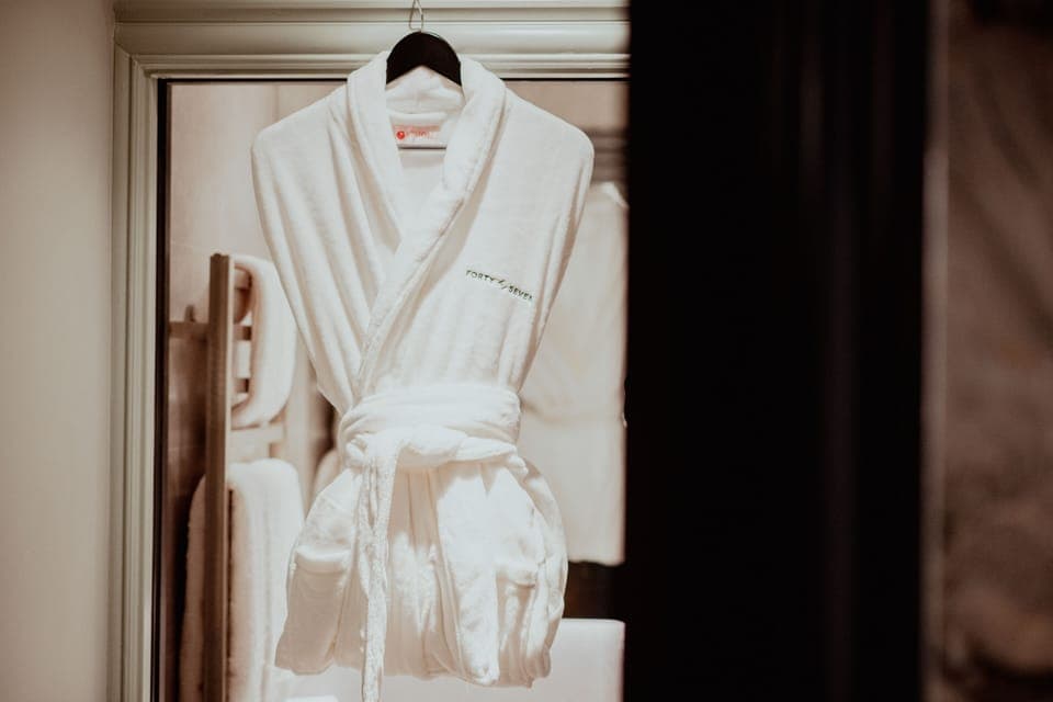 Shower, rainfall showerhead, designer toiletries, hair dryer