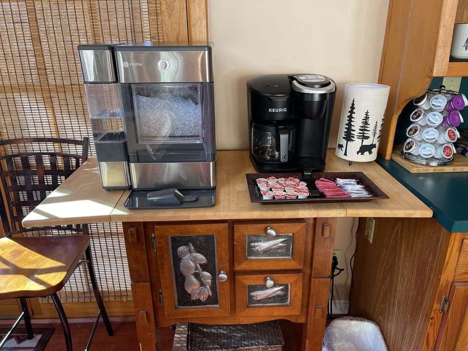 Fully stocked coffee bar, and GE Profile Ice maker, for drinks or ice coffees
