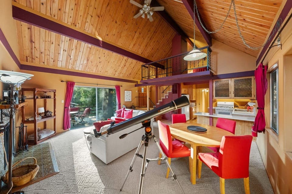The open-concept common area makes entertaining effortless. A te - The open-concept common area makes entertaining effortless. A telescope is also available for stargazing.