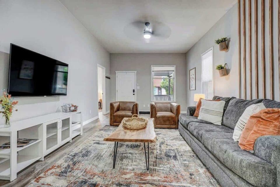 Enjoy relaxing in the spacious living room with the large 55" Smart TV!