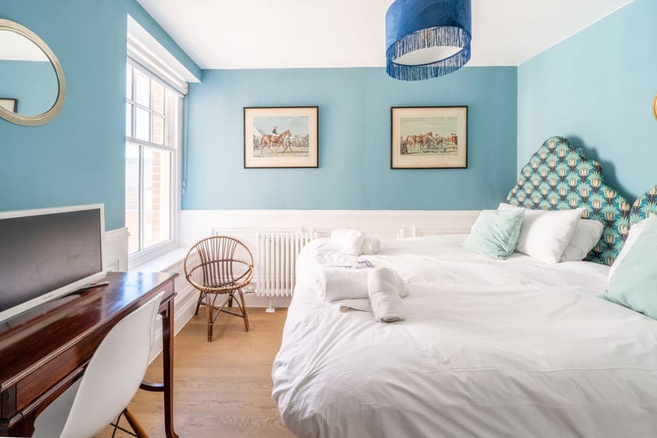 Master bedroom with king-size bed