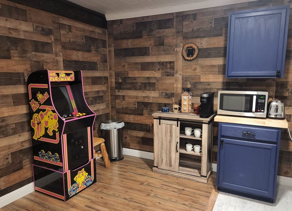 Ms. Pac Man arcade game with 14 different games and a coffee bar. 