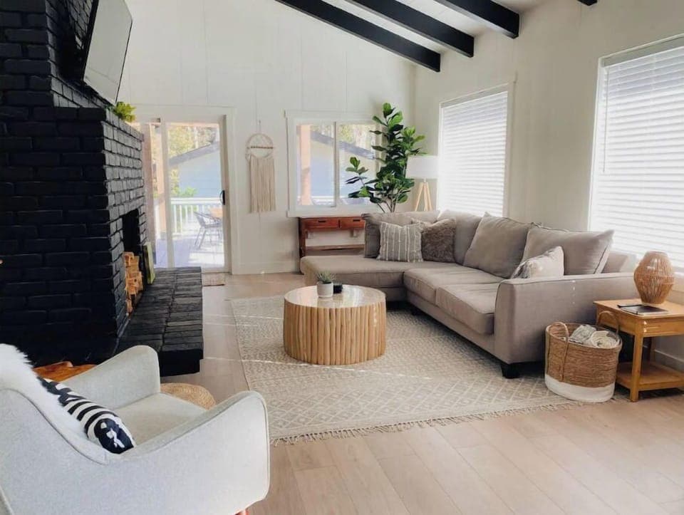 Spacious living room with TV