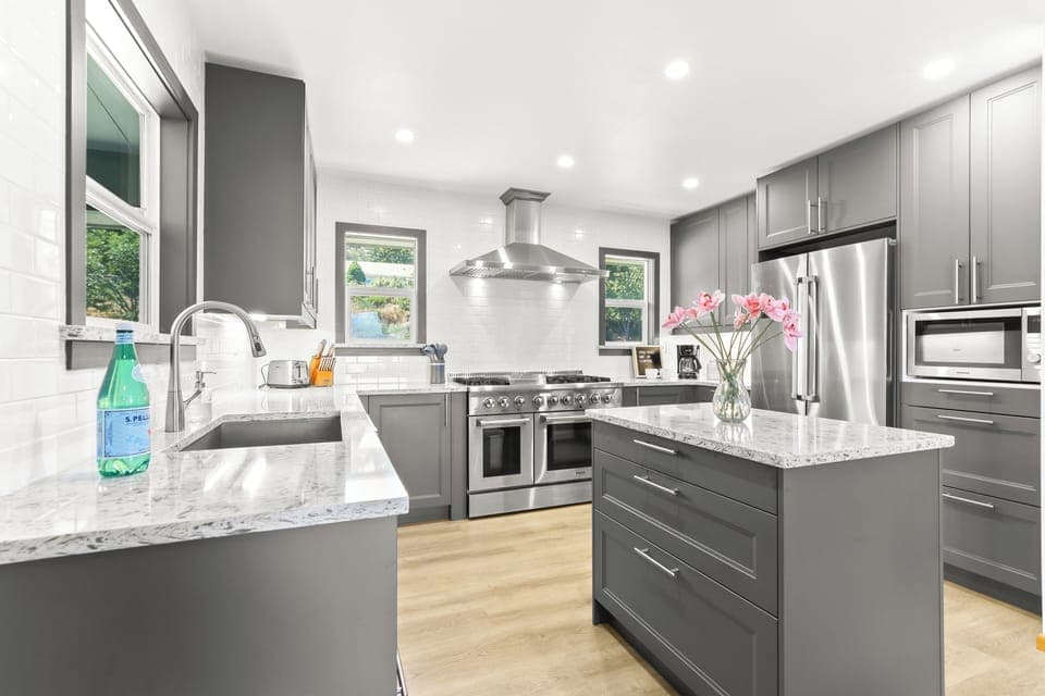 A fully remodeled chef's kitchen that is both beautiful, practical, and ready 4U