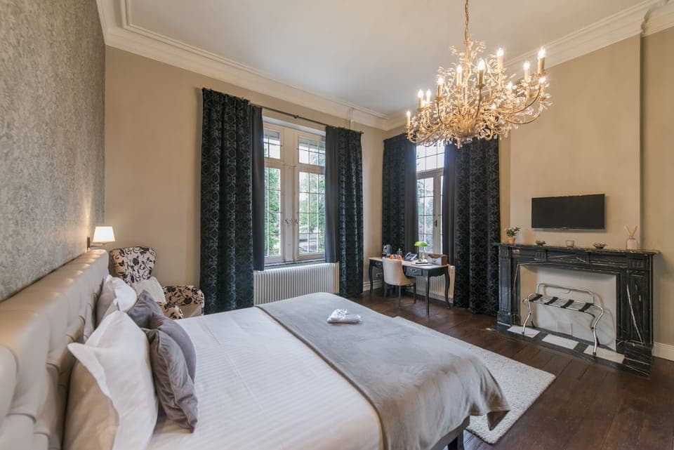 Premium bedding, down comforters, Tempur-Pedic beds, minibar