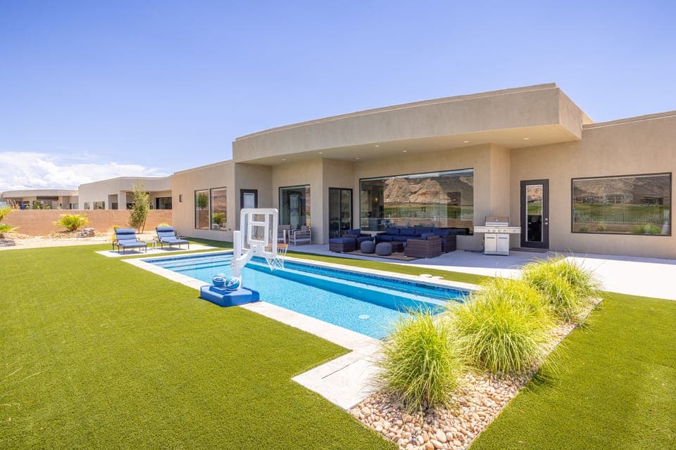 Back yard view of pool - View of the fun amenities available for you when you are a guest at our home.