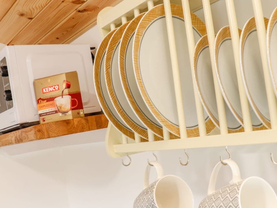 Fridge, electric kettle, toaster, cookware/dishes/utensils