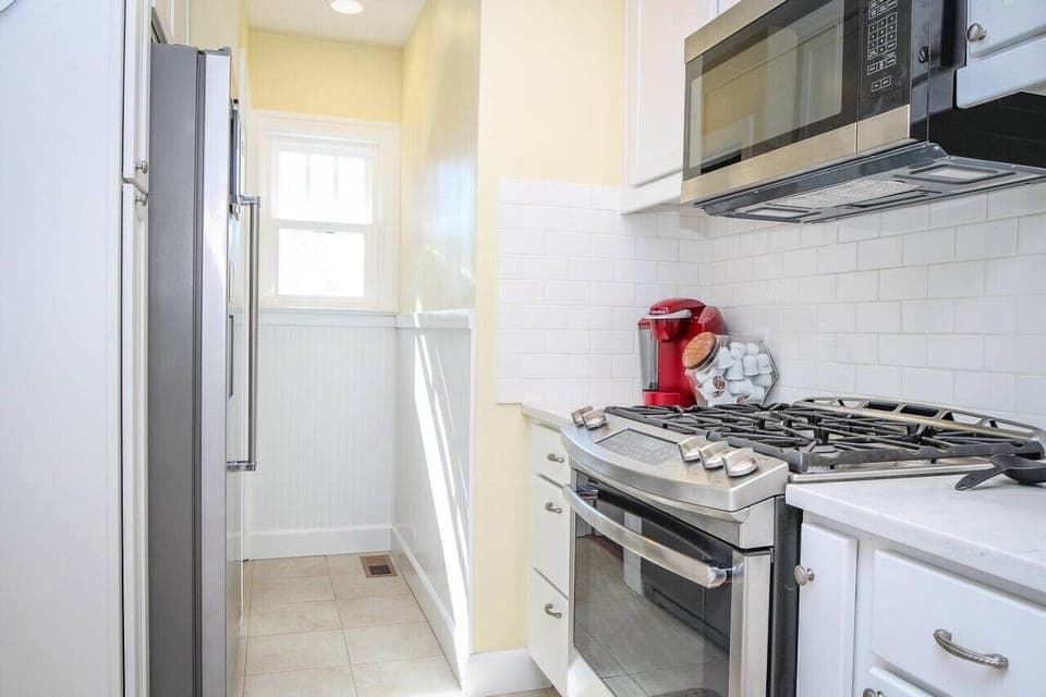 The kitchen is well appointed with high-end appliances and finishes.