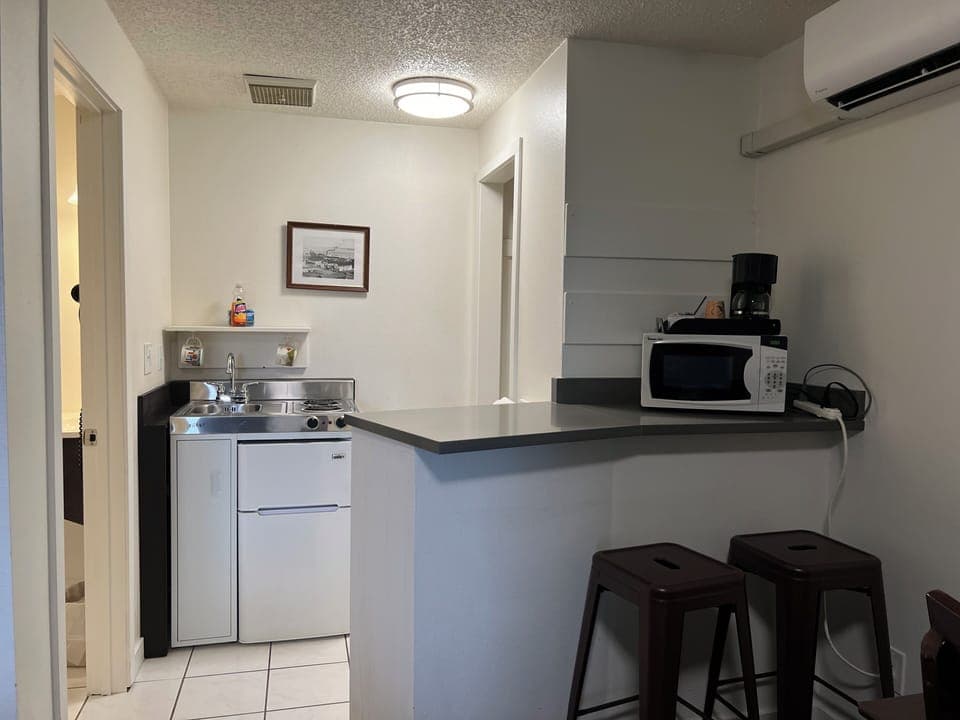 Queen Room | Blackout drapes, iron/ironing board, free WiFi, bed sheets