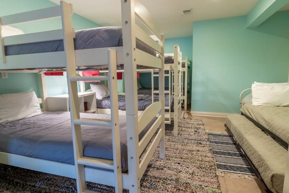 Garden Level | Bedroom 4 | Three Bunk Beds, Daybed with Trundle