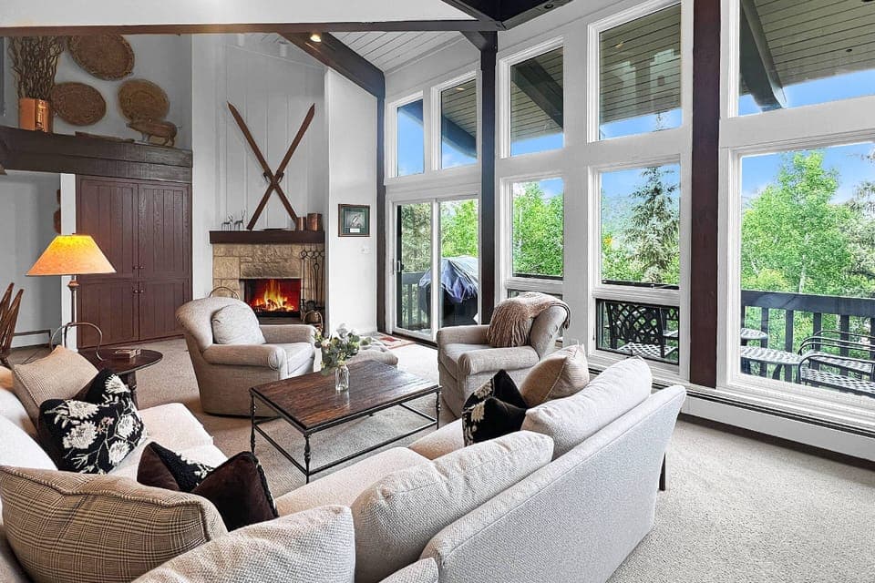 You will love all the natural light from the floor to ceiling windows in the living room!