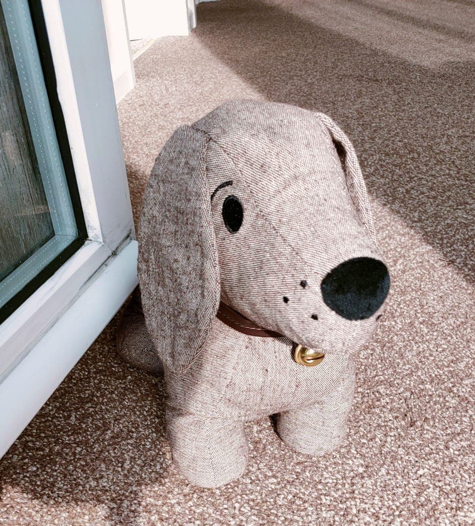 Meet Pebbles the dog.  He welcomes all who stay! 