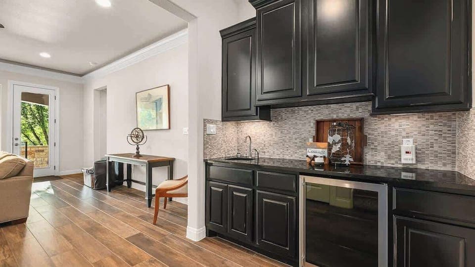 Head downstairs to access the secondary living area.