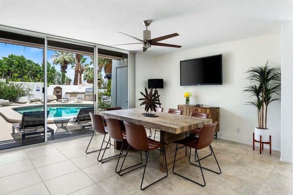 A beautifully designed dining area with a touch of mid-century modern inspiration