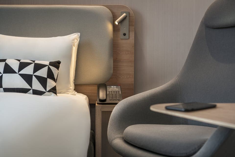 Premium bedding, individually furnished, desk, blackout drapes