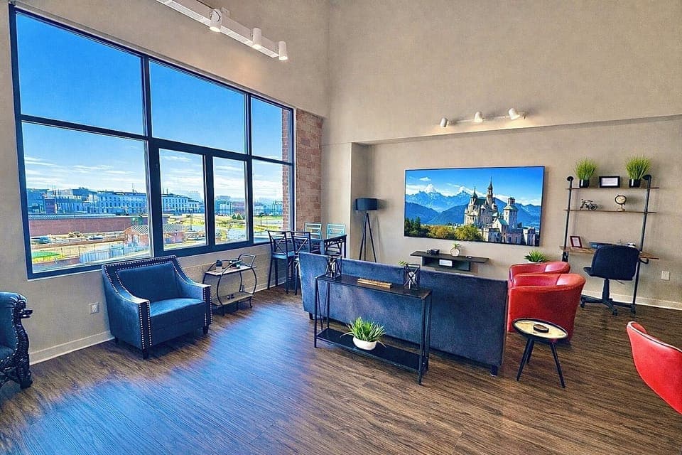 Open-concept living area with cozy seating, modern finishes, and plenty of space to unwind. Ideal for groups to relax and enjoy time together.