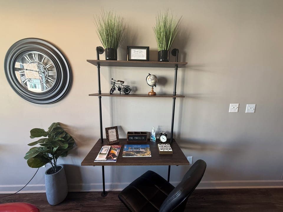 Dedicated workspace with desk, décor, and natural light. Ideal for remote work or planning your next day of adventure.