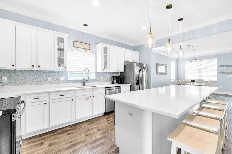 Classic & Elegant Stainless Steel Appliance Filled Kitchen, Large Granite Island