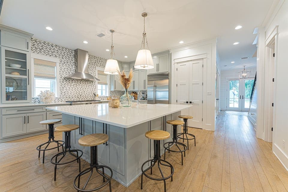 Gourmet Kitchen. Island Seating for 6. Double Ovens. 6 Burner Stove with Griddle, Microwave, Dishwasher, and More.