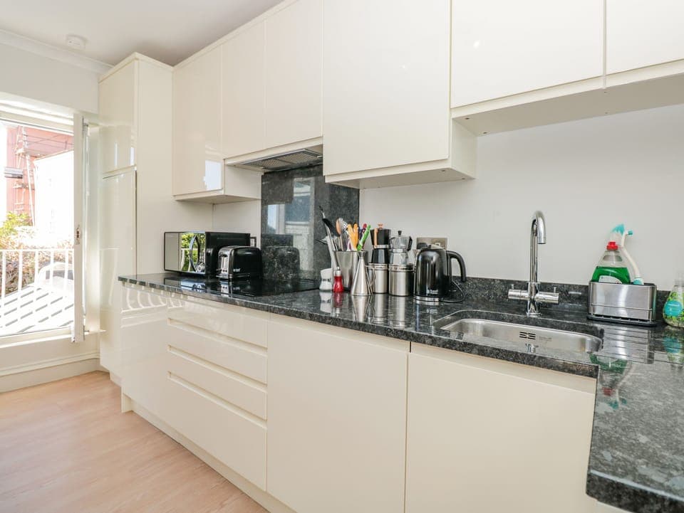 Fridge, dishwasher, electric kettle, toaster