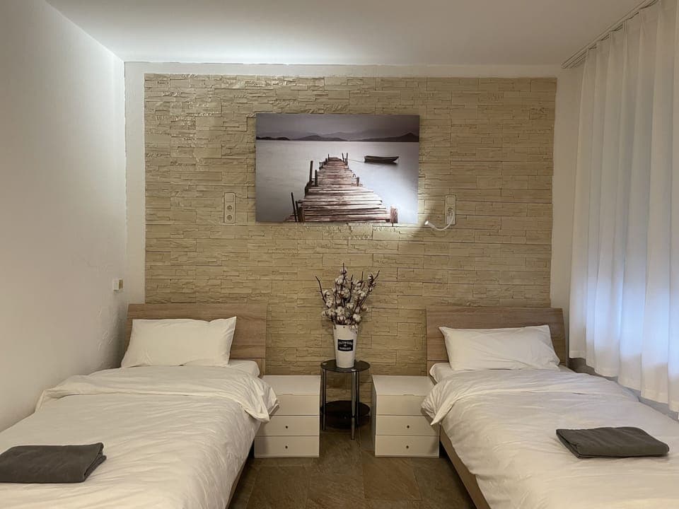 Basic Room, 2 Twin Beds, Shared Bathroom | Desk, free WiFi, bed sheets