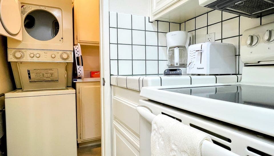 Laundry center includes detergent for guest use.
