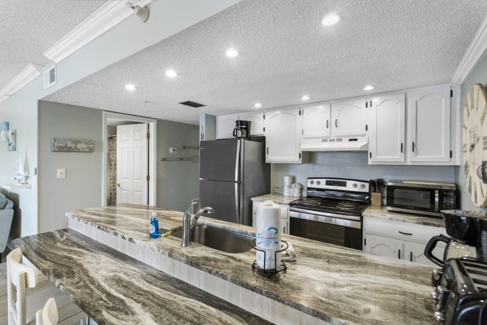 Spacious kitchen with granite counters