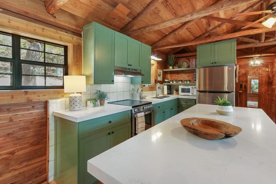 Full size kitchen featuring stainless steal appliances
