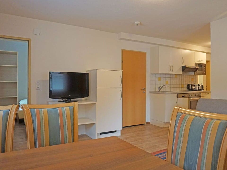 Furniture, Table, Cabinetry, Home Appliance, Wood, Living Room, Interior Design, Building, Flooring, Shelving