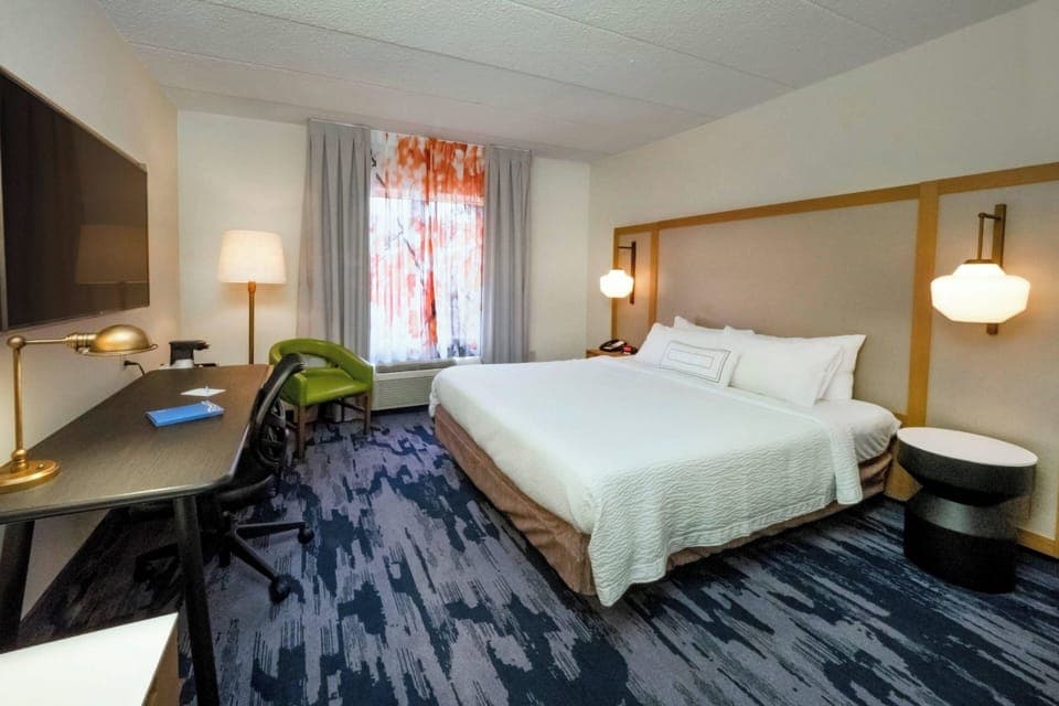 Room, 1 King Bed | Desk, blackout drapes, iron/ironing board, free WiFi