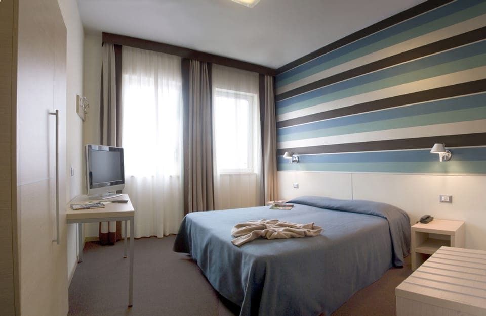 Standard Double Room | Down comforters, in-room safe, individually decorated, desk