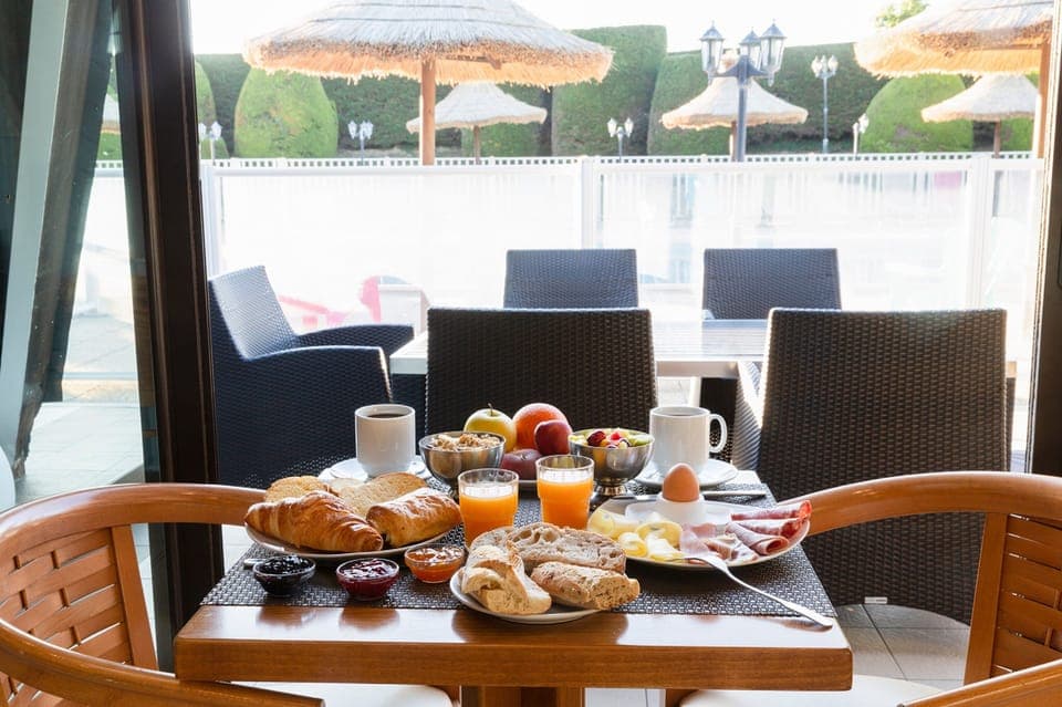Daily buffet breakfast (EUR 18 per person)