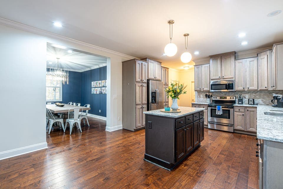 The updated, open concept kitchen allows you to prepare a meal while still enjoying time with your family in the dining room or living room.