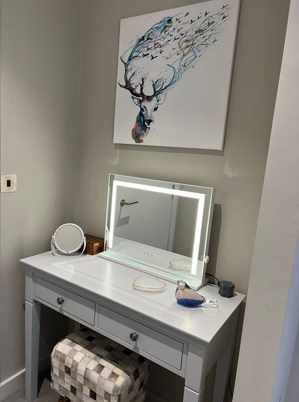 Dressing table and stool situated within the bedroom