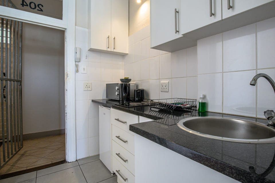 Apartment (1 Bedroom) | Private kitchen | Mini-fridge, microwave, stovetop, toaster