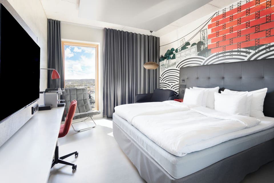 Room, 1 King Bed (Solo Up King with extrabed) | Minibar, in-room safe, individually decorated, desk