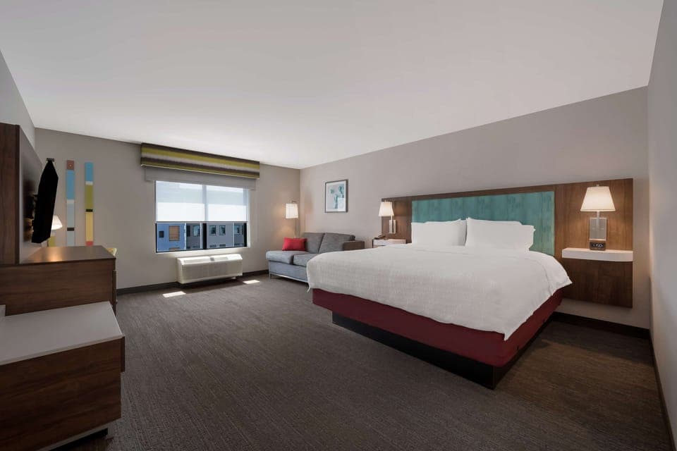 Studio Suite, 1 King Bed | Living area | 55-inch TV with cable channels, Netflix, streaming services