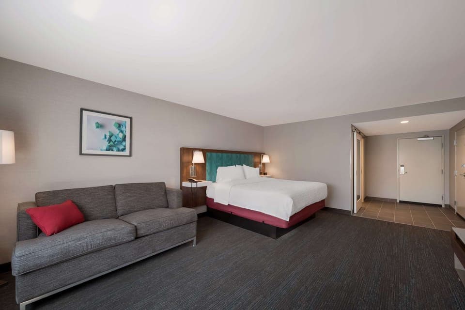 Studio Suite, 1 King Bed | Living area | 55-inch TV with cable channels, Netflix, streaming services