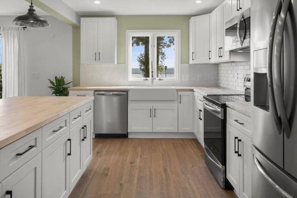 The galley style kitchen offers state of the art appliances and every amenity you will need to cook a unforgettable meal.