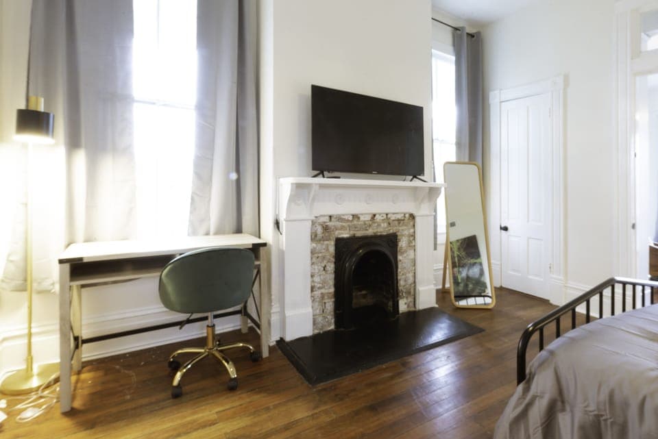 The Magnolia Room is a second floor private bedroom with queen bed