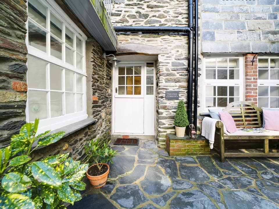 Seating in the courtyard outside the property