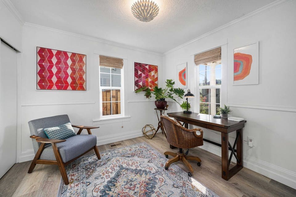 Cozy office off of the living room separated by french doors