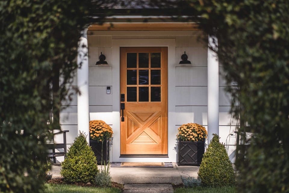 Large manicured hedge providing privacy for the house