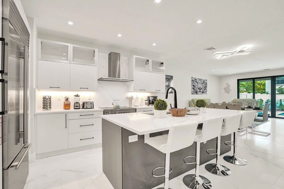 The modern, gourmet kitchen comes fully equipped with everything you could need.