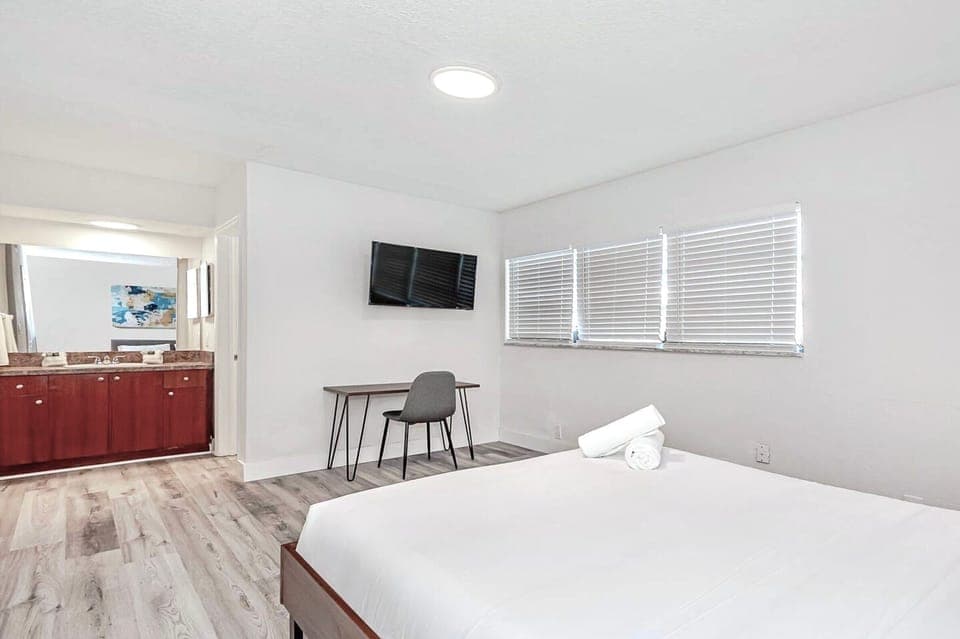 Alternative view of primary bedroom. Entry way to separated vanity for convenience.