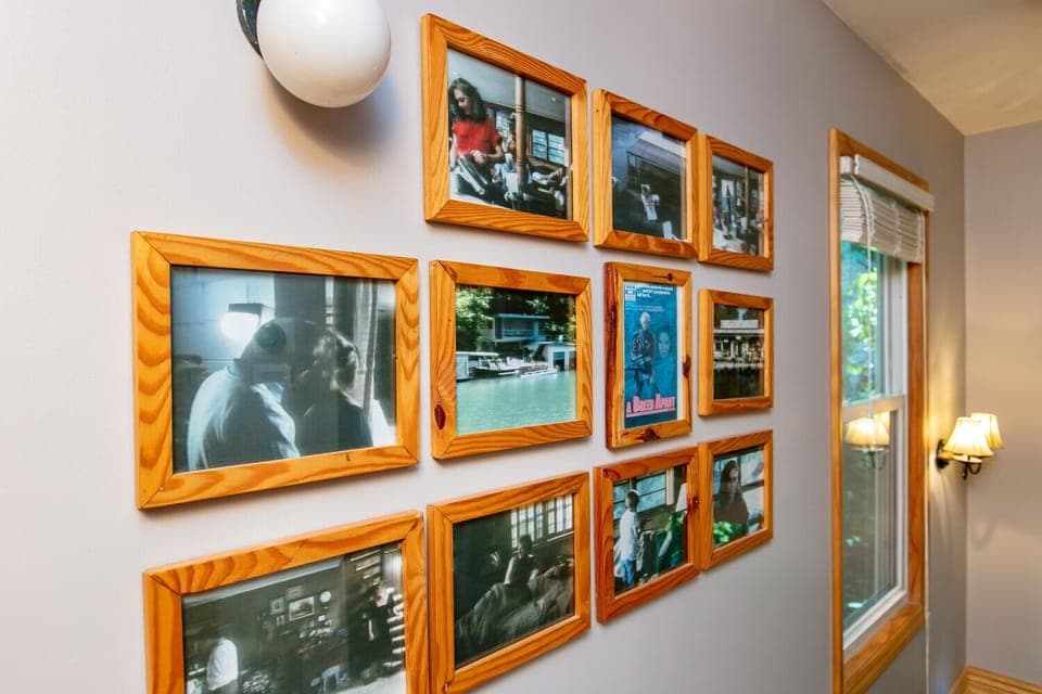 Collage of Pictures and Authentic light fixture from the 1984 Hollywood Film, "A Breed Apart" filmed in the house. The movie stars, Kathleen Turner, Rutger Hauer and Powers Booth